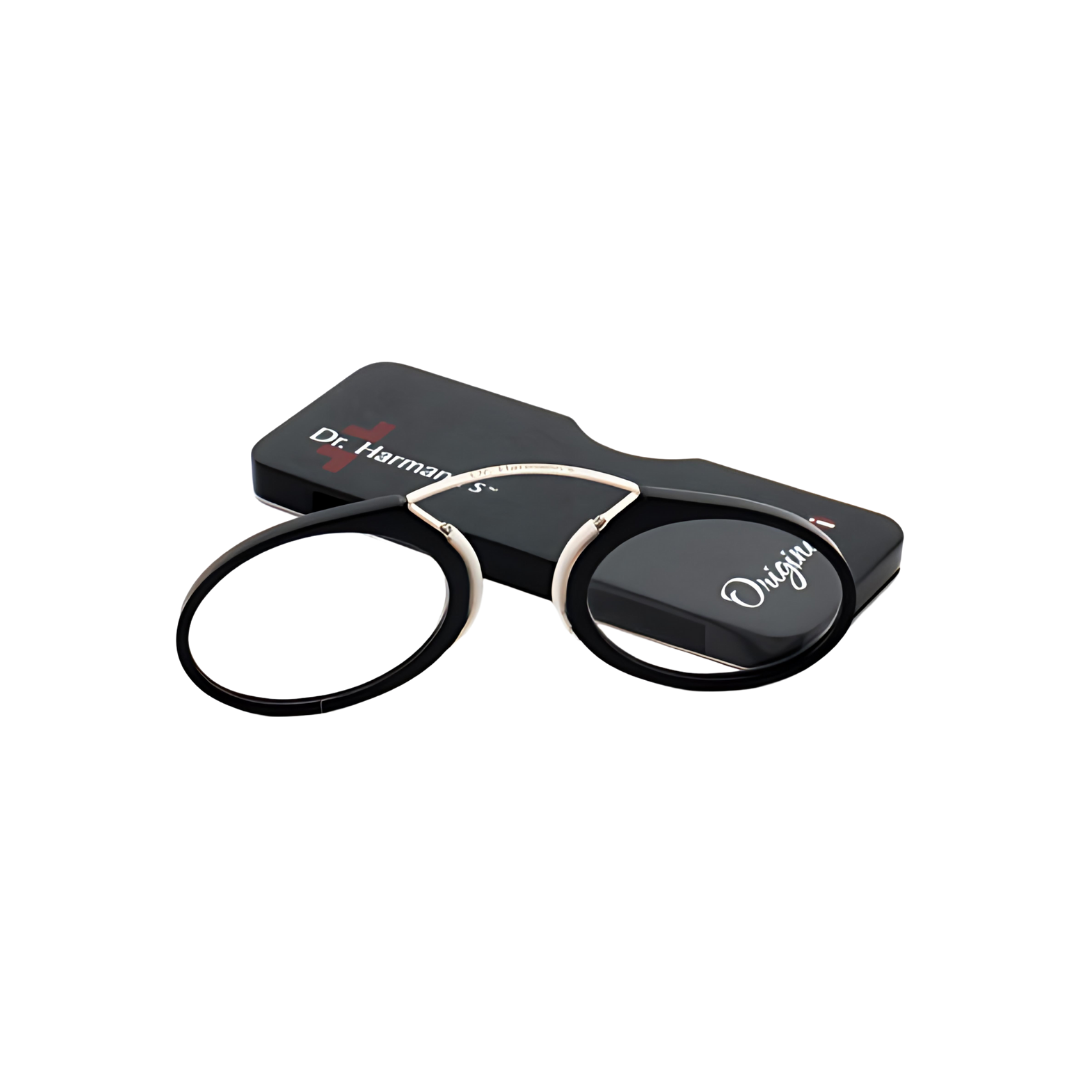 Optical Duniya Dr. Harmanns reading glasses Originali on a bookshelf