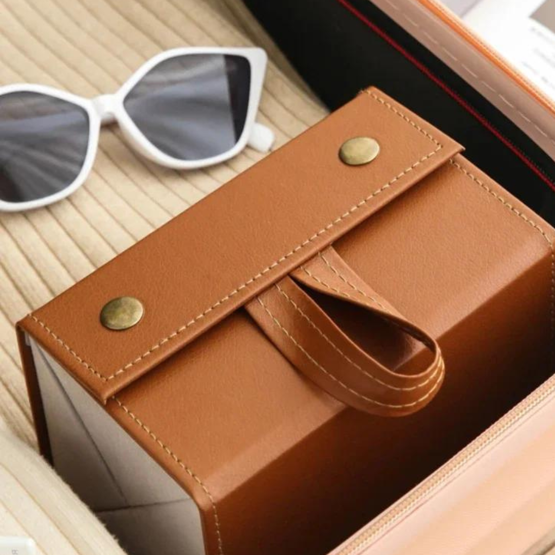 Sunglasses being placed into the compartments of the Optical Duniya Locker for safekeeping.